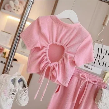 В търговията на дребно през 2023 г., Нови летни модни розови комплекти за момичета, отгоре с отворен гръб + панталони от 3 до 10 години